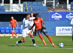 Elijah Adebayo holds off Romal Palmer