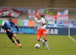 Kal Naismith brings the ball forward