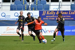 Jordan Clark tries to wriggle his way past Francisco Sierralta