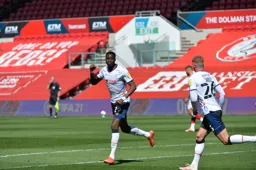 Elijah Adebayo salutes scoring the second goal.