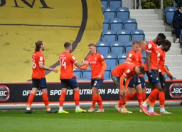 George Moncur congratulates Kiernan Dewsbury-Hall after he had levelled the score