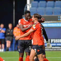 Harry Cornick opens his account for the season and is congratulated by Elijah Adebayo