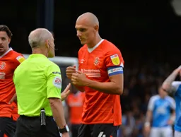Kal Naismith pleading his innocence with the referee