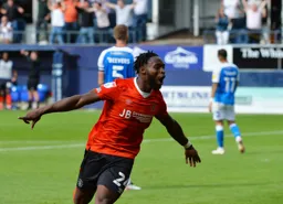 Fred Onyedinma celebrates his fine debut performance by capping it off with a goal