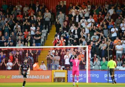 James Shea applauds the travelling fans before kick off