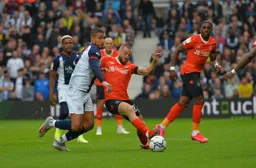 Allan Campbell battling Jake Livermore in the middle of the park