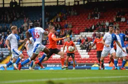 Luke Berry about to slam the ball in and level the game deep into added time