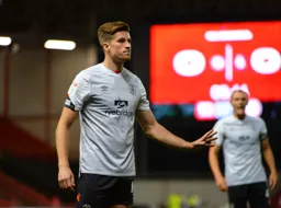 Reece Burke is ready for action and his hair is fantastic as usual