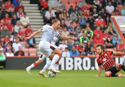 Kal Naismith leaving Ben Pearson on the floor