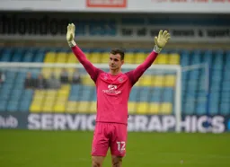 Simon Sluga lapping up the ovation from the travelling Hatters