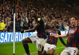 Elijah at the corner flag at Pride Park