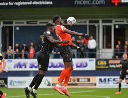 Elijah Adebayo holds the ball up