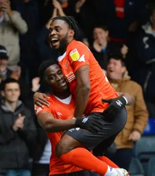 Fred Onyedinma jumps into Elijah Adebayo's arms