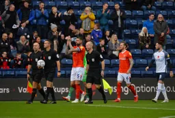Sonny Bradley leads the team out at Deepdale