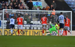 Simon Sluga getting down low to make the save