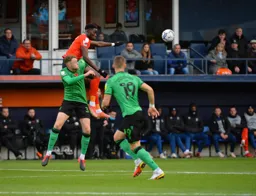 Elijah Adebayo rises highest against Harry Souttar