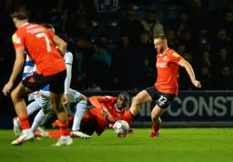 Allan Campbell taking control of the ball in midfield
