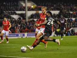 Fred Onyedinma sending in a cross
