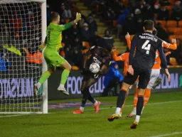 Elijah Adebayo nods in at the near post