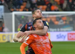 Reece Burke challenging for the ball and delighted that no retrospective action can now be taken