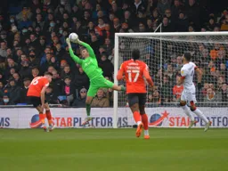 James Shea gathers a high ball