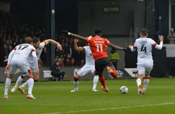 Elijah Adebayo winds up for a shot