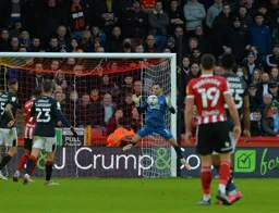 James Shea makes a routine stop