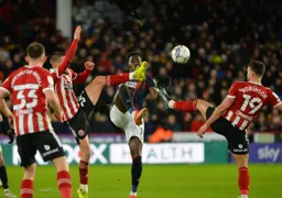 Elijah Adebayo putting a foot in