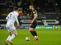 Danny Hylton holds up the ball