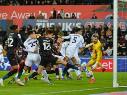 Reece Burke sticks a foot out