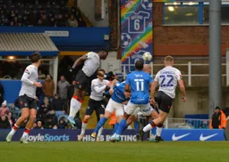 Elijah Adebayo wins the aerial battle from a set piece