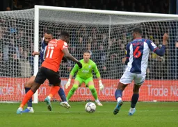 Elijah Adebayo about to cut in and have a shot