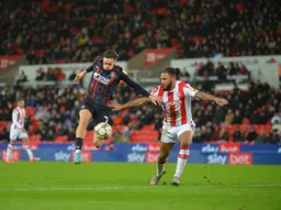 Harry Cornick controlling the ball with style and going round the outside of the defence