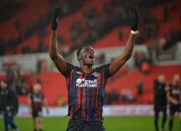 Elijah Adebayo celebrating with the crowd after a great result