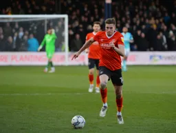 Reece Burke charging forward