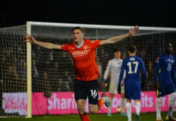 Reece Burke celebrating putting Luton ahead against Chelsea