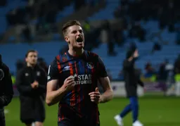 Reece Burke fist pumps for the crowd