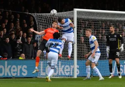 Reece Burke trying to get the near post flick on