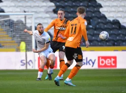 Allan Campbell drives the ball forward