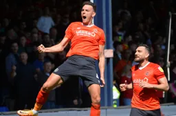 Kal Naismith celebrates opening the scoring with Robert Snodgrass