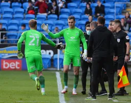 Harry Isted comes on for his debut replacing the injured James Shea