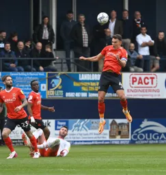 Kal Naismith about to head it back across goal