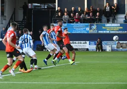 Sonny Bradley stabs home from a Kal Naismith free kick