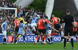 Danny Hylton goes close to nodding the Hatters ahead from a corner