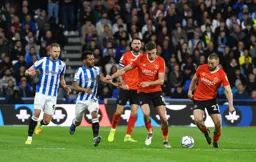 Allan Campbell tries to start an attack with Reece Burke