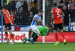 Matt Ingram smothers the ball under pressure