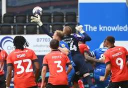 Ethan Horvath gets a hand to the ball in a crowded penalty area