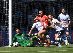 Allan Campbell goes after a loose ball