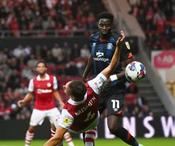 Elijah Adebayo sends former Hatter Kal Naismith sprawling