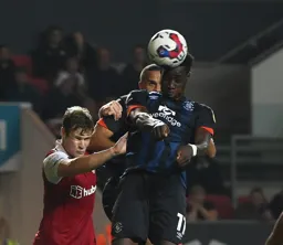 Elijah Adebayo wins a header